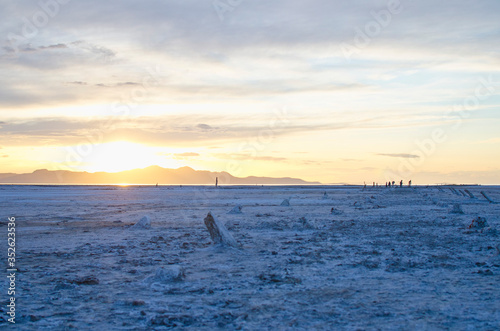 The empty and plain open landscape of the cool cold salt lake salt flats. © Bric