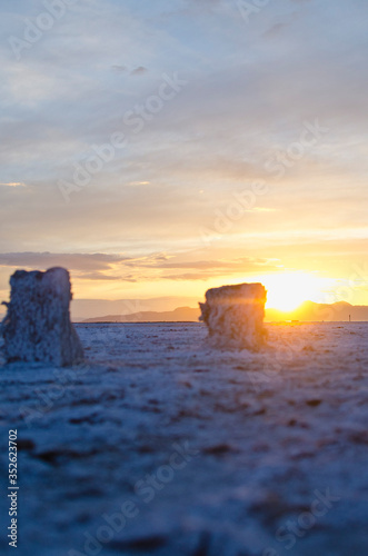 A long view of the old salty post from the pier ruins in the great salt lake lake bed in utah. 