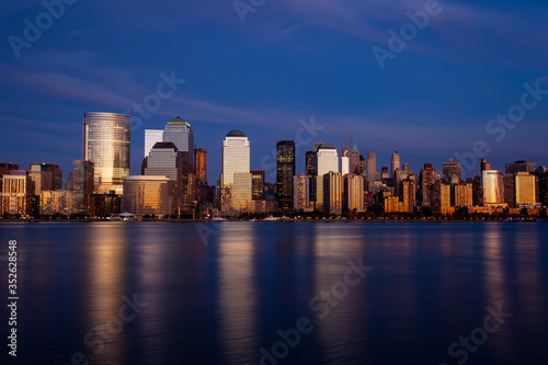 New York City skyline at twilight with reflection on the Hudson River © Matt Bango