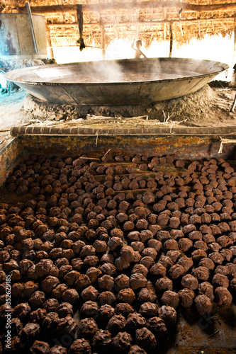 Jaggery making in process - in a traditional indian kitchen.