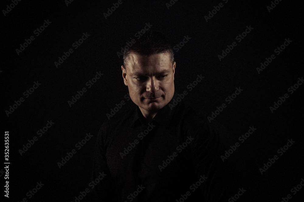 Portrait of a man on a black background