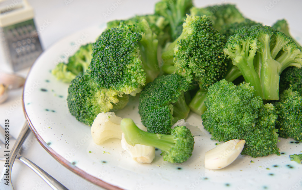 broccoli on a plate with garlic broccoli on a plate with garlic