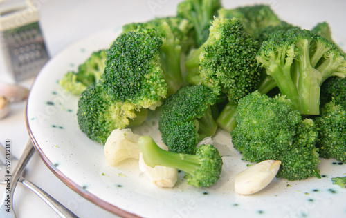 broccoli on a plate with garlic