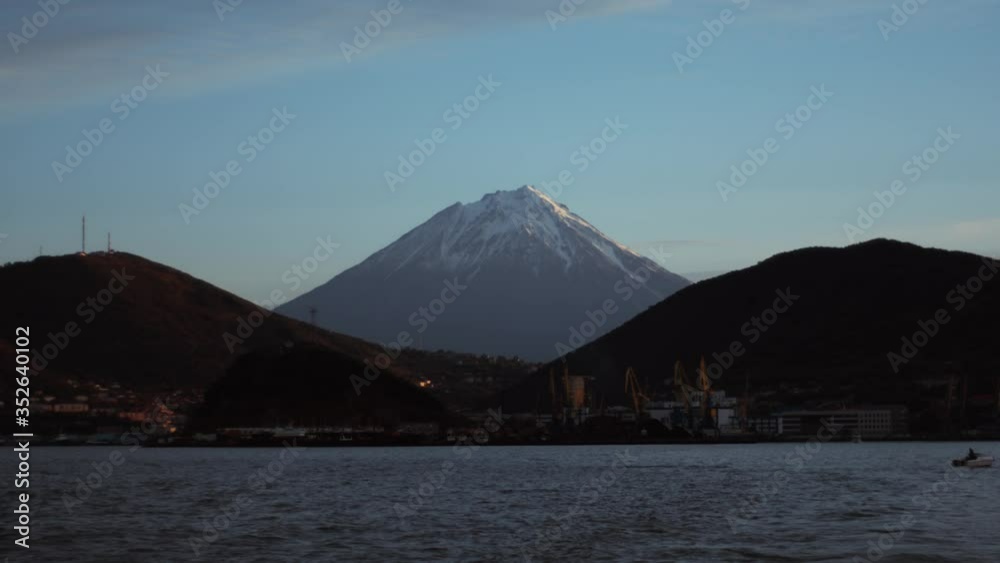 landscape of Klyuchevskaya Sopka volcano from Kamchatka, sea, mountains and port landscape of Klyuchevskaya Sopka volcano from Kamchatka, sea, mountains and port