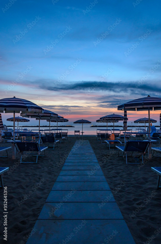 Fototapeta premium Empty beach walkway at dawn