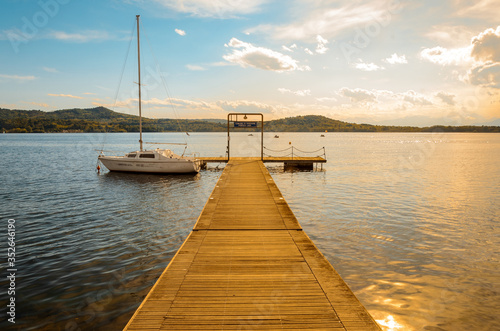 Wallpaper Mural Lake pier with boat at sunset Torontodigital.ca