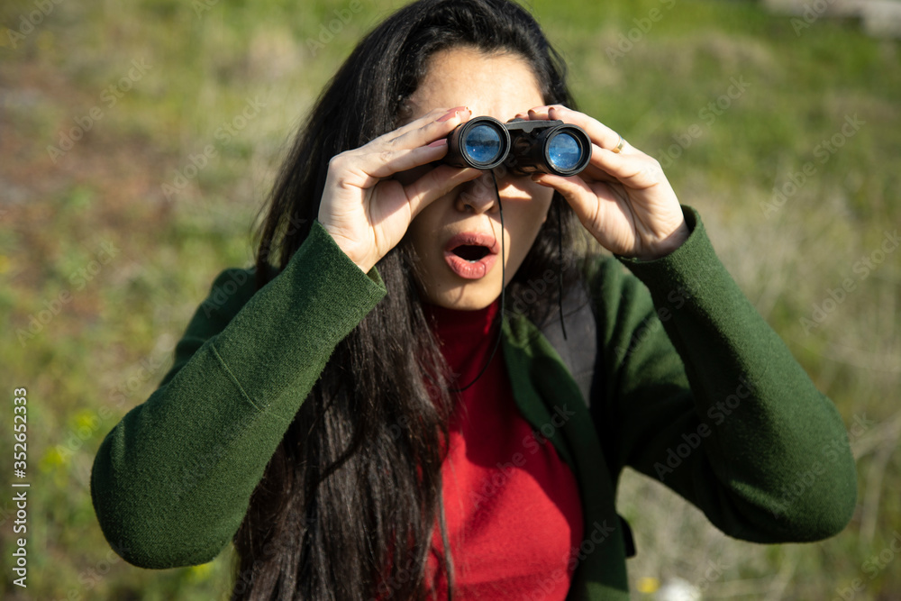 surprised woman hand binoculars surprised woman hand binoculars