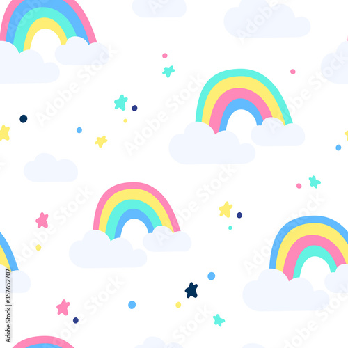 Seamless childish pattern with hand drawn rainbows and stars, .Creative scandinavian kids texture for fabric, wrapping, textile, wallpaper, apparel. Vector illustration