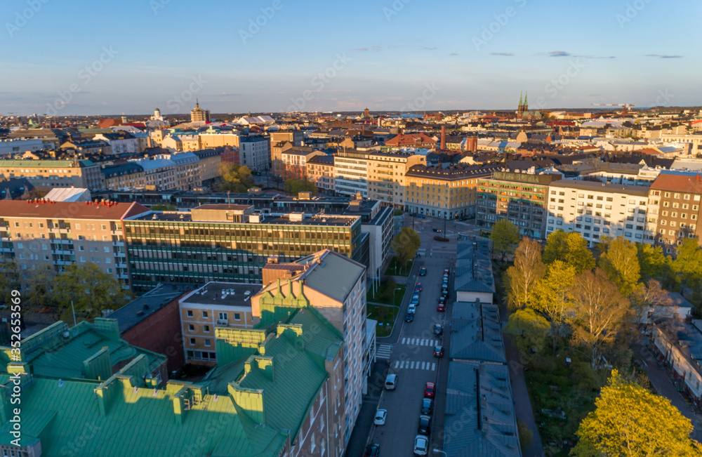 Aerial sunset view of beautiful city Helsinki . Colorful sky and colorful buildings. Helsinki, Finland.
