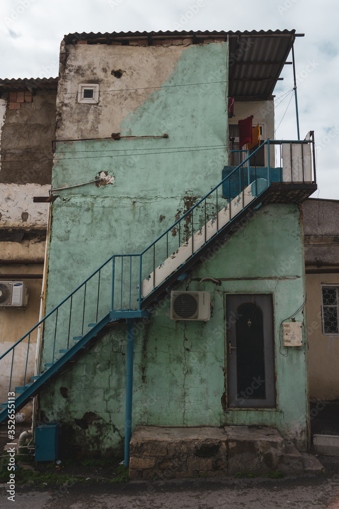 Fototapeta premium Old city with soviet streets and old houses and windows