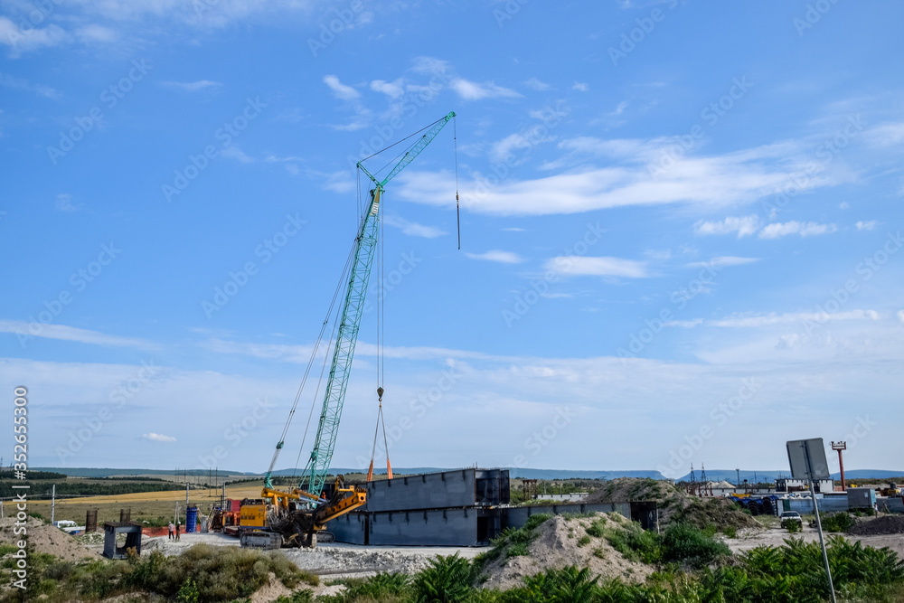 Steel parts of bridge structure. Construction of a road junction.