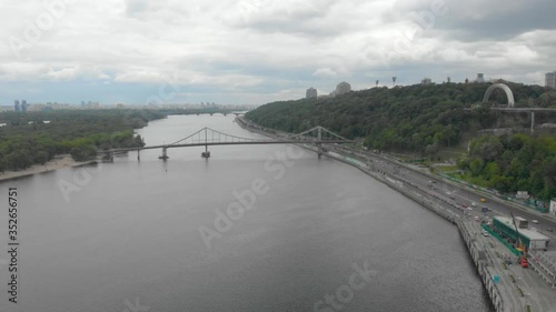 Wallpaper Mural Aerial river bridge cityscape promenade forest park cloudy rainy right side drone camera movement Dnipro river Kyiv Ukraine Torontodigital.ca