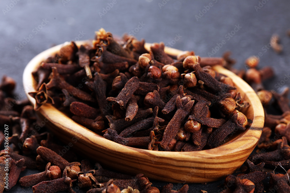 freshly dryed cloves spice texture on background freshly dryed cloves spice texture on background