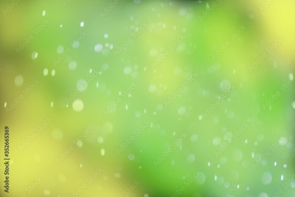 spring background.Blue, green defocus bokeh background. Drops of dew or rain. Design element. spring background.Blue, green defocus bokeh background. Drops of dew or rain. Design element.