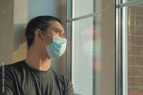 Self-isolation of a man at home during coronavirus