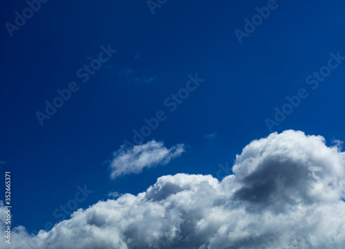 Blue sky with rayny clouds high angle view