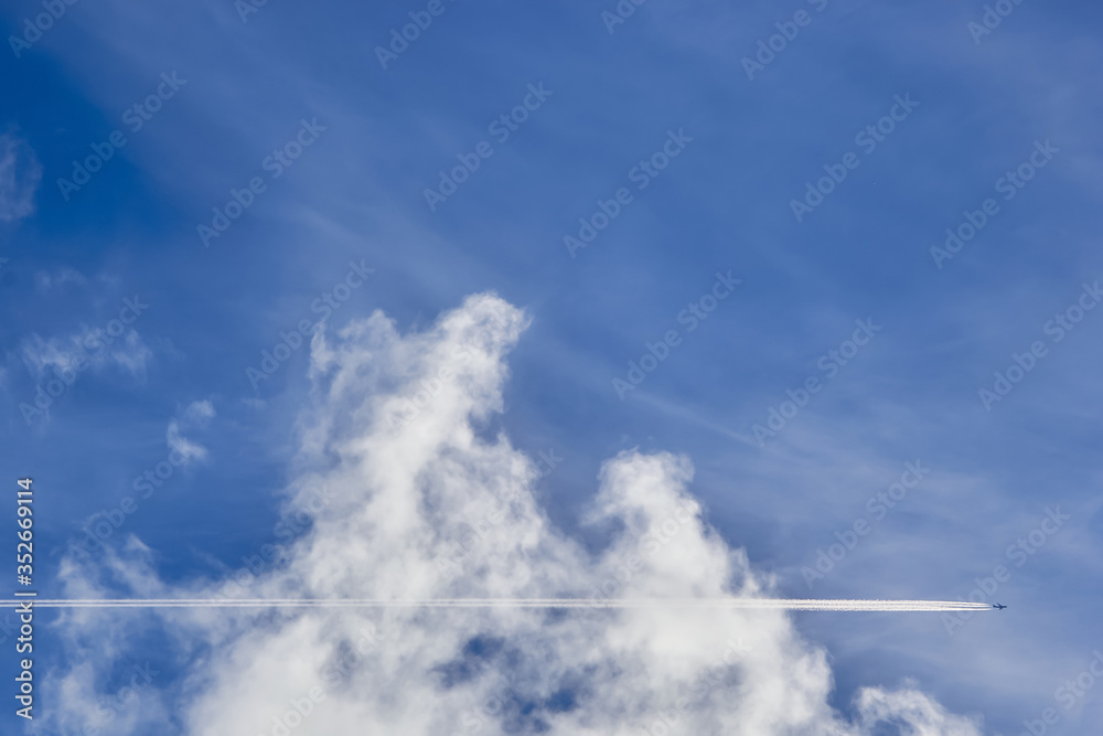 flying Cumulus clouds against a blue sky flying Cumulus clouds against a blue sky