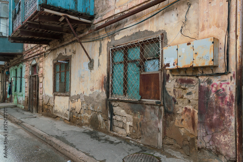 Old city with soviet streets and old houses and windows
