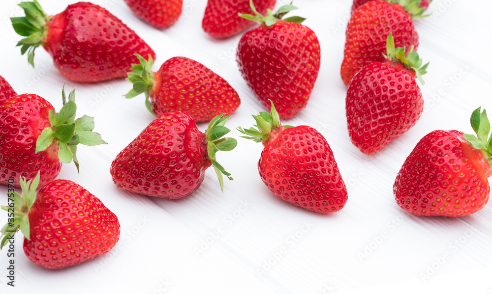 strawberries on a white wooden background strawberries on a white wooden background
