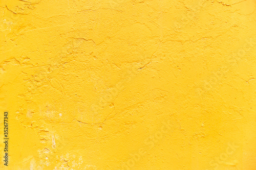 yellow colored concrete wall texture background