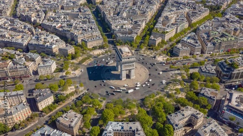 Wallpaper Mural flight over paris city sunny day famous triumph arch traffic circle streets aerial timelapse panorama 4k france Torontodigital.ca