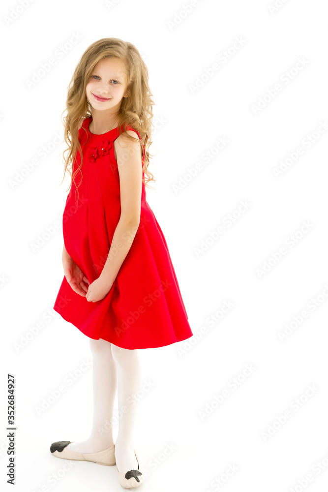 Full Length Portrait of Pretty Preteen Girl Standing Looking to