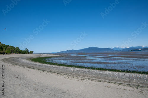 A shoreline of Spanish banks at low tide.      Vancouver BC Canada 