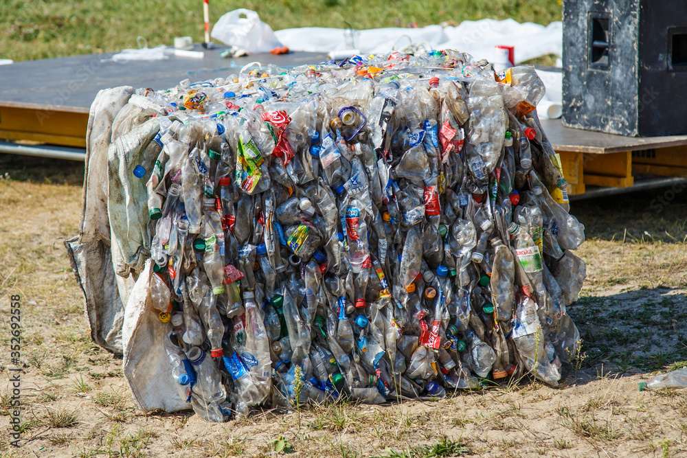 Obraz premium Ukraine Kiev MAY 10, 2019.Plastic bottles pressed and packed for recycling. recycling To conserve the environment concept.plastic bottles are collected to be melted into new plastic items.