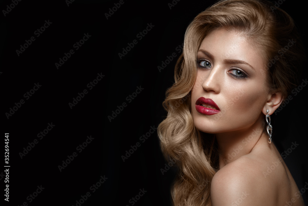 Beautiful girl with red lips and classic makeup and curls. Beauty face Beautiful girl with red lips and classic makeup and curls. Beauty face