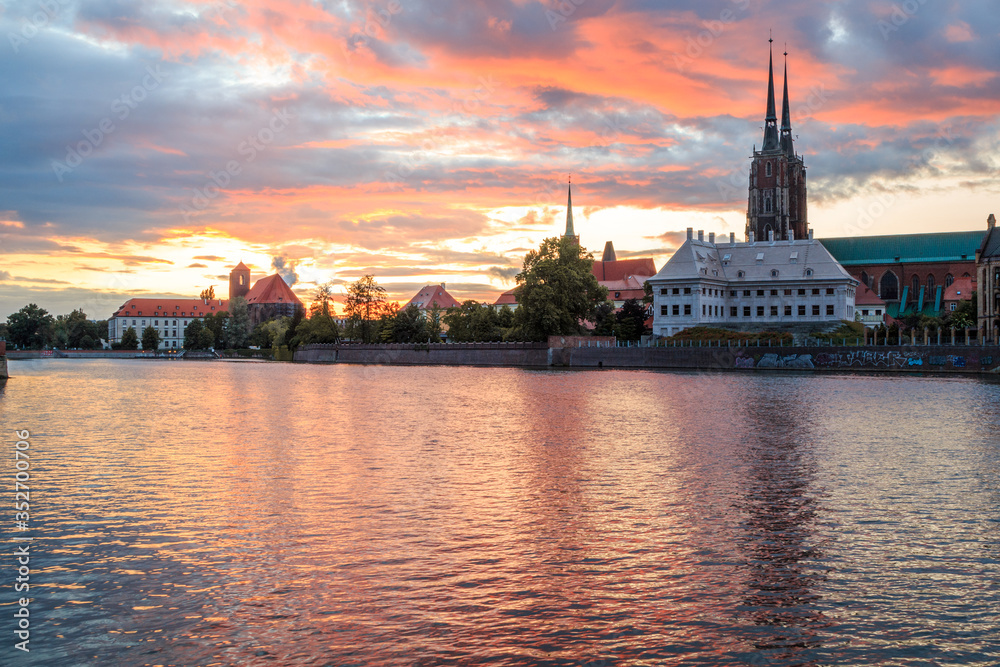 sunset over the Odra River and the historical part of Wroclaw sunset over the Odra River and the historical part of Wroclaw