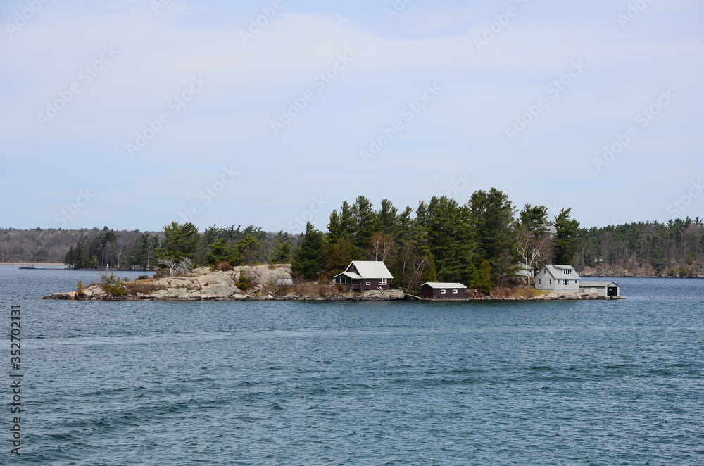 One Island in Thousand Islands Region in fall of New York State, USA