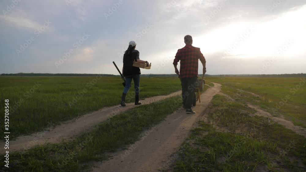 Teamwork in agricultural harvest farming. Concept of happy friendly family. Teamwork in agricultural harvest farming. Concept of happy friendly family.