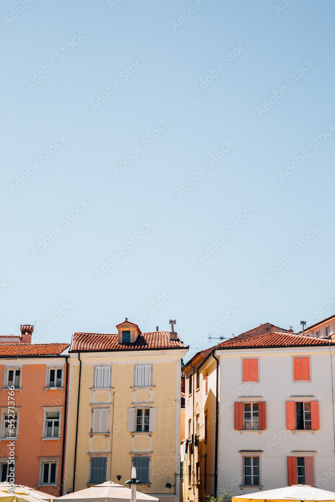 Old town colorful buildings with blue sky in Piran, Slovenia