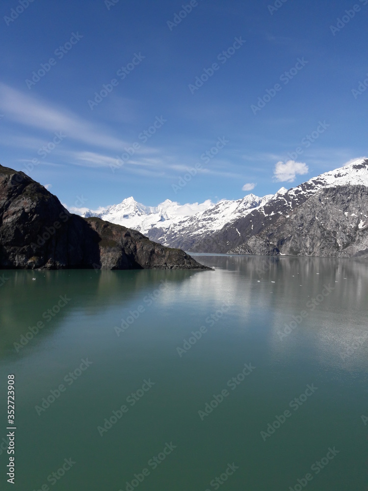 Alaska glacier, lake, canal, mountains and snow with a clear blue sky on a sunny spring day 2018 Alaska glacier, lake, canal, mountains and snow with a clear blue sky on a sunny spring day 2018