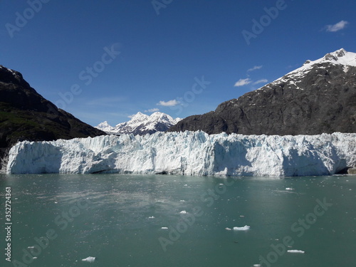 Alaska glacier, lake, canal, mountains and snow with a clear blue sky on a sunny spring day 2018 © CURTIS