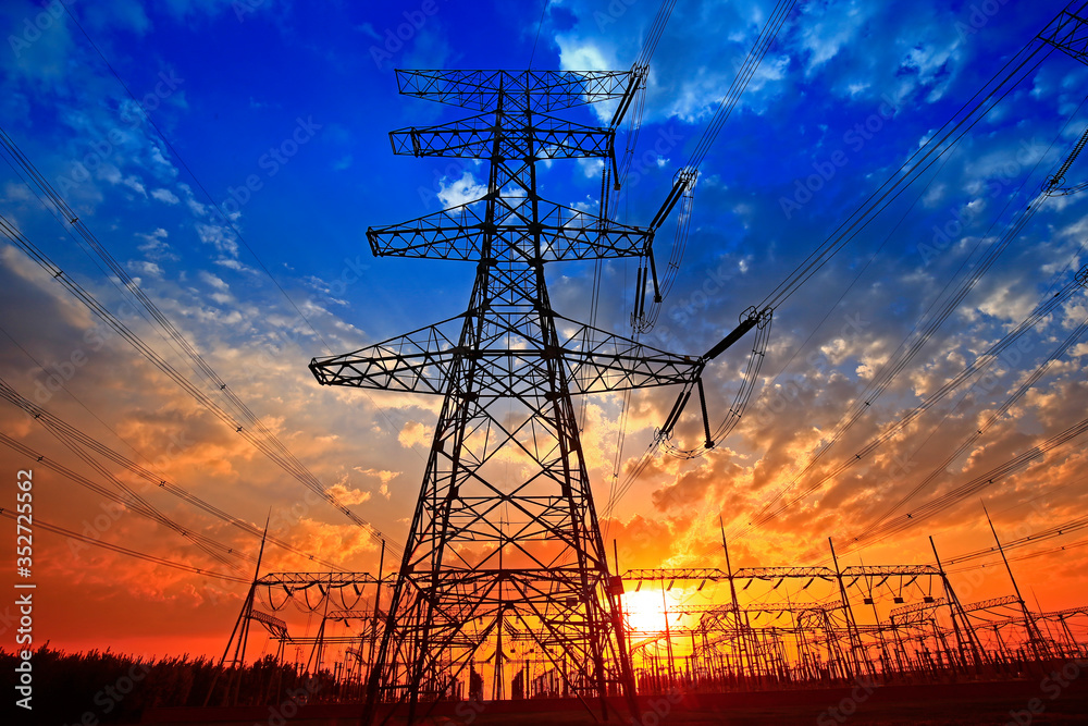 Electric tower, silhouette at sunset Electric tower, silhouette at sunset
