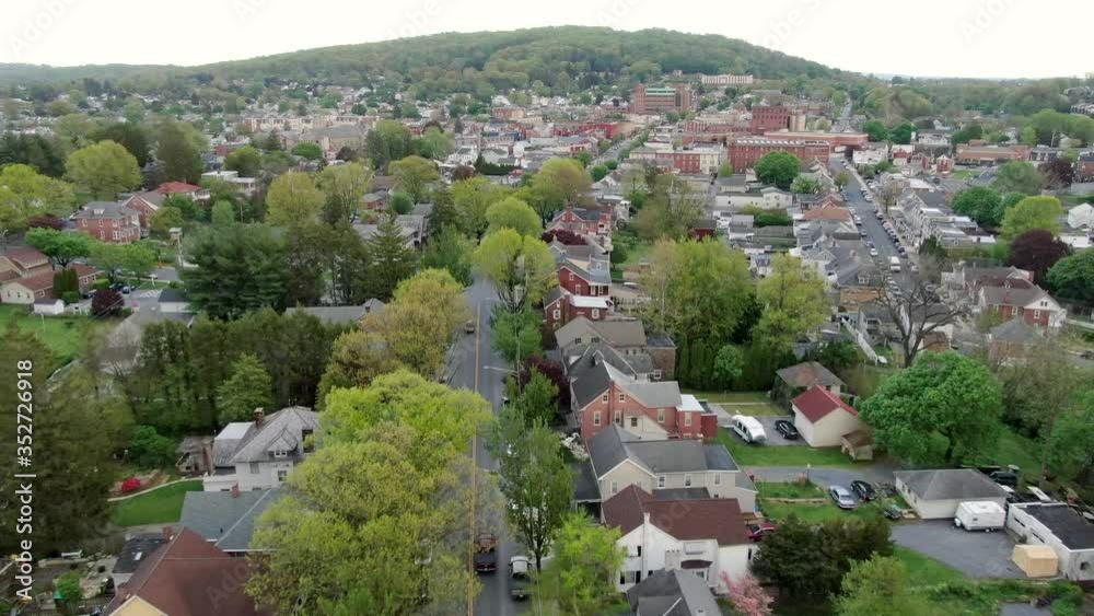 Aerial dolly shot above anytown USA, Small Town America reveals houses, neighborhood home in Ephrata, Lancaster County, Pennsylvania community Aerial dolly shot above anytown USA, Small Town America reveals houses, neighborhood home in Ephrata, Lancaster County, Pennsylvania community