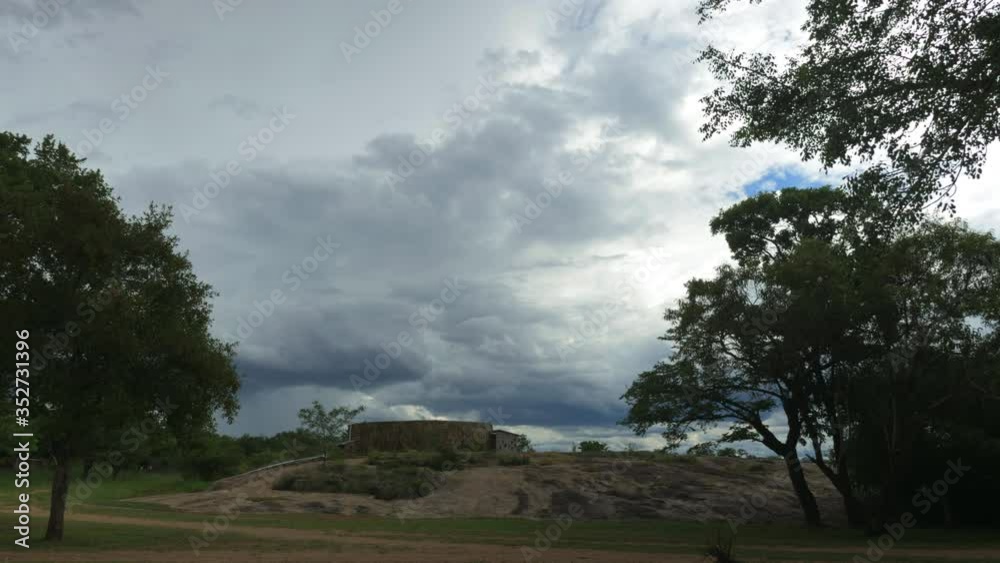 Storm clouds forming over man-made reservoir on top of hill (4K Time Lapse). Storm clouds forming over man-made reservoir on top of hill (4K Time Lapse).