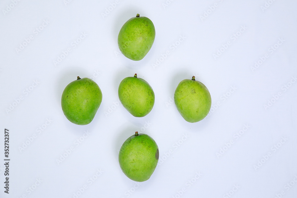 Fresh ripe green color mangoes isolated on white background Fresh ripe green color mangoes isolated on white background