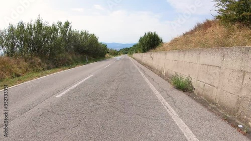 Wallpaper Mural secondary paved road leaving Radicofani, Province of Siena, Tuscany, Italy Torontodigital.ca