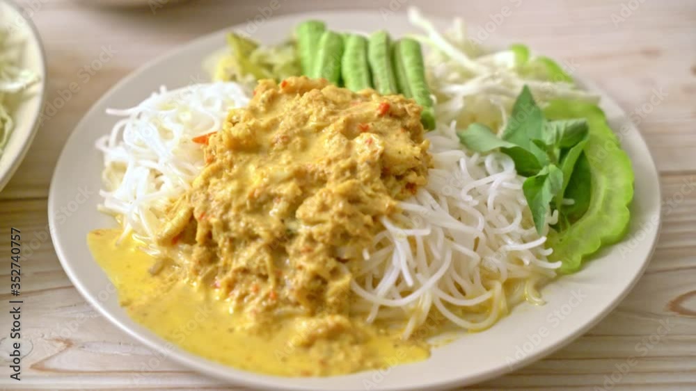 Thai Rice Noodles with Crab Curry and Variety Vegetables - Thai local southern food Thai Rice Noodles with Crab Curry and Variety Vegetables - Thai local southern food