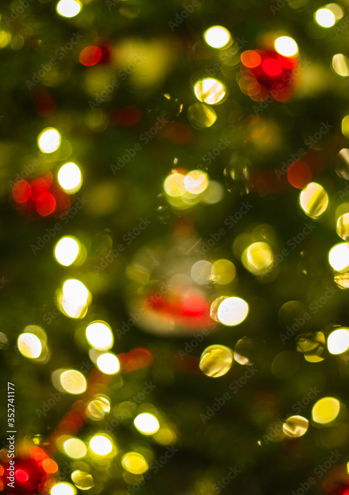 De-Focused Lights of a Christmas Tree - Background Image, green, red, and golden Bokeh De-Focused Lights of a Christmas Tree - Background Image, green, red, and golden Bokeh