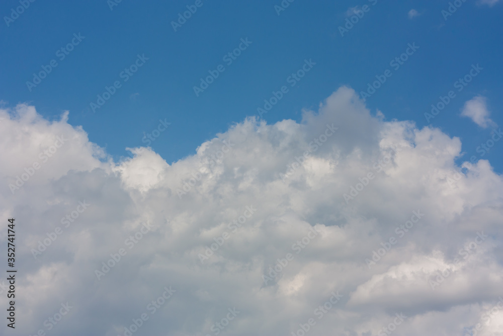 Fototapeta premium Beautiful white clouds in the spring sky of Krasnodar.