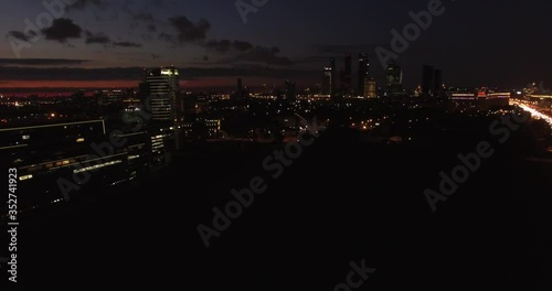 4K night aerial video of Kutuzovskiy Avenue highway at Victory Park and memorial complex in Poklonnaya Hill, near Moscow River in Moscow, Russia