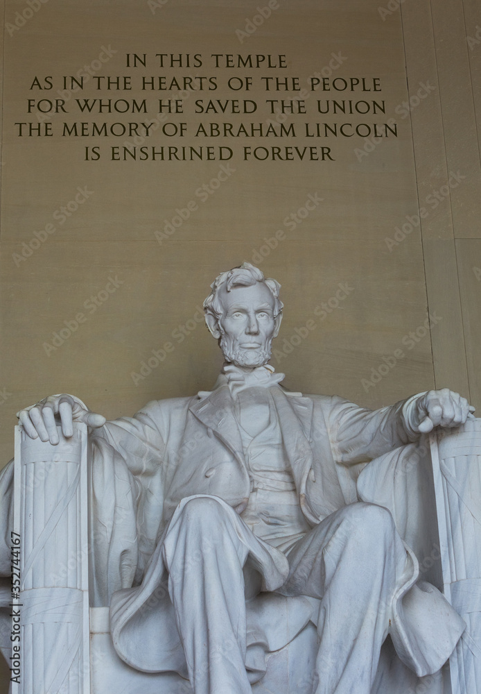 Fototapeta premium Washington DC, USA - 22 Dec 2019: Inside the Abraham Lincoln Memorial; Statue with Quote above