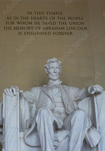 Washington DC, USA - 22 Dec 2019: Inside the Abraham Lincoln Memorial; Statue with Quote above