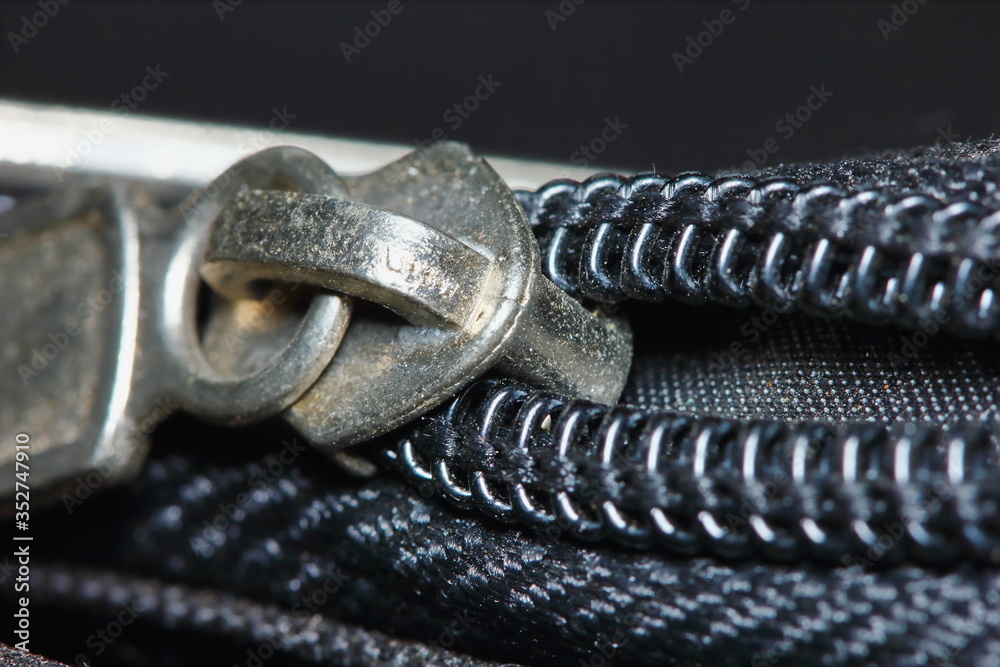 blact cloth texture and zipper in abstract macro for background blact cloth texture and zipper in abstract macro for background