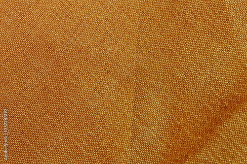 beautiful yellow texture of cloth in abstract macro for background