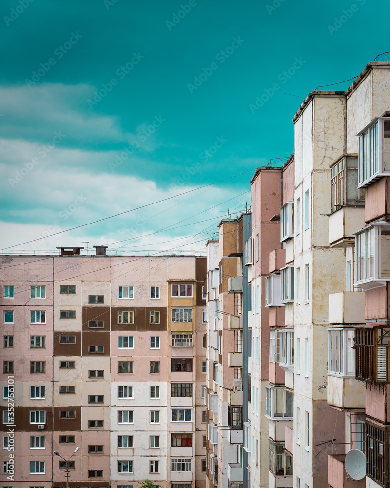 Facade of a building and cloudy sky. Bratsk, Russia