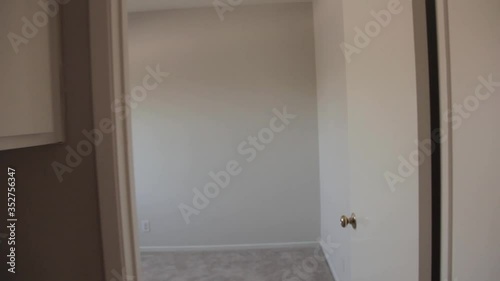 POV walking into room middle class family suburb house home hallway